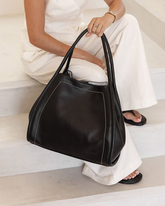Sutton In Black